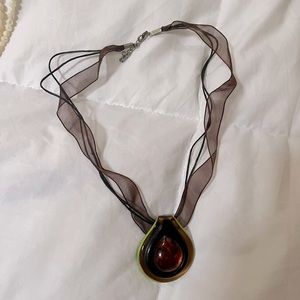 Neckless brown stone with band sheer